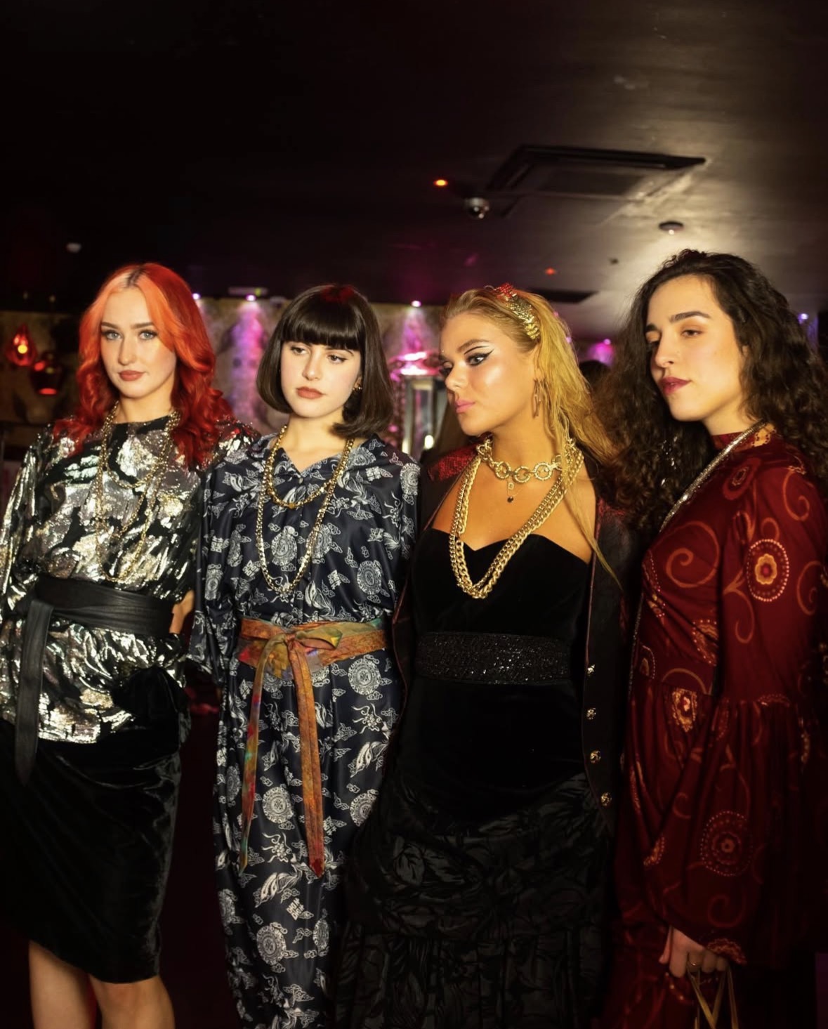 Fashion show models in elegant outfits